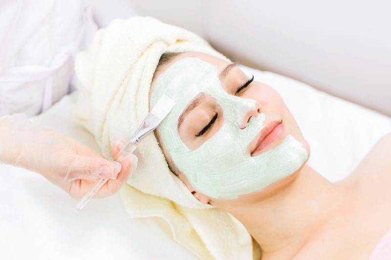 Lady getting spa treatment at beauty salon.