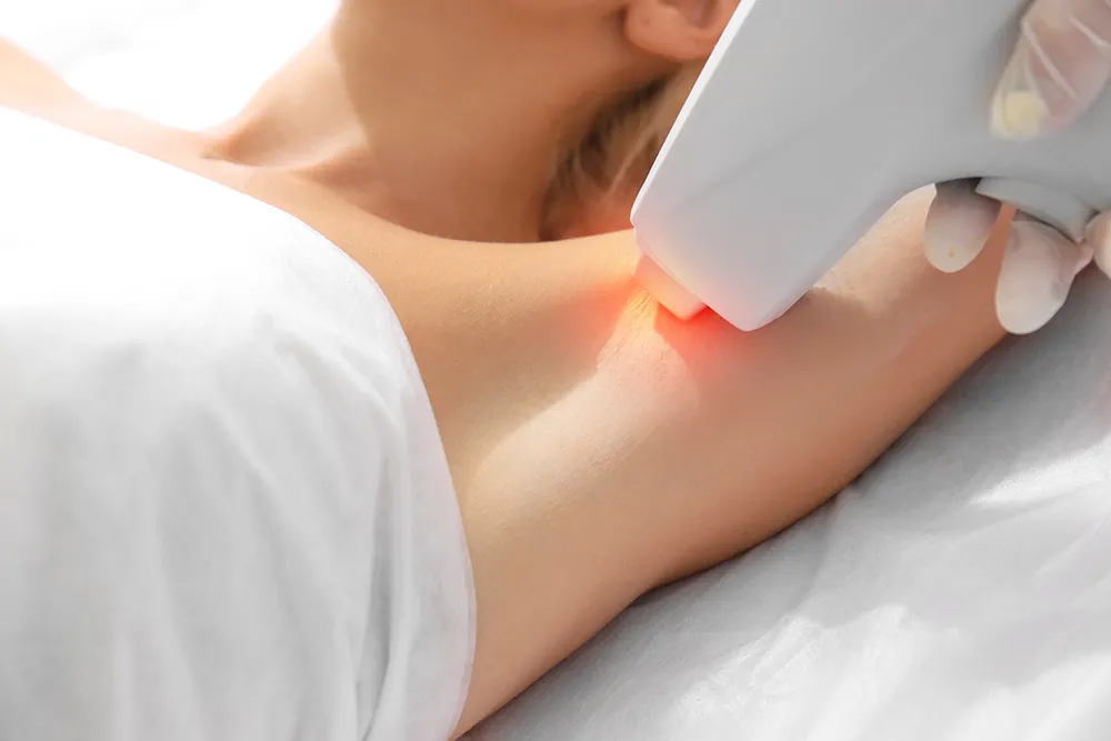 Woman getting laser treatment on her armpit 